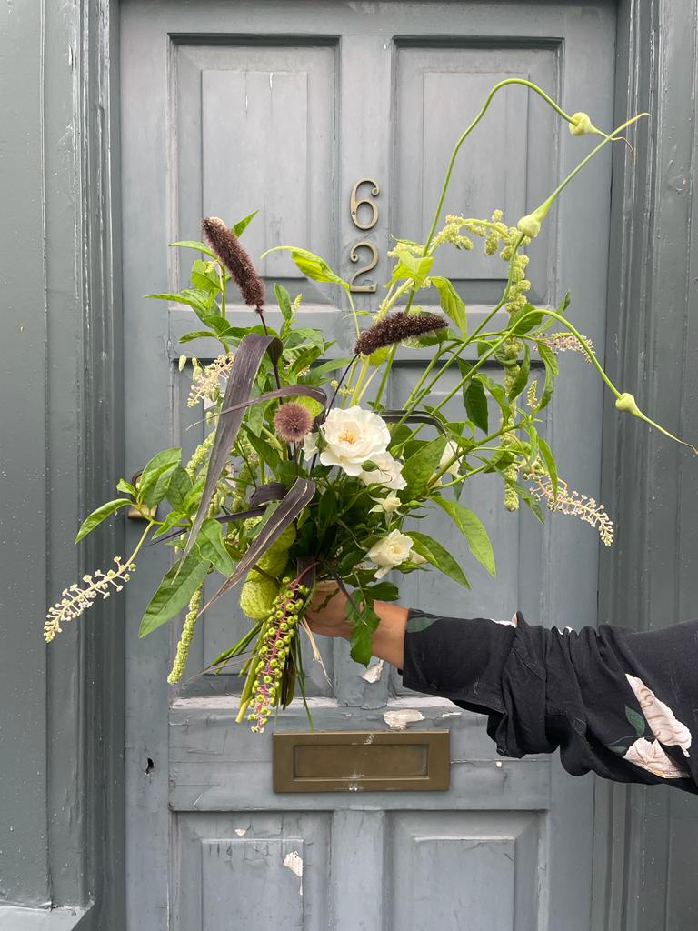 A Simple Grass and white spontaneous bouquet